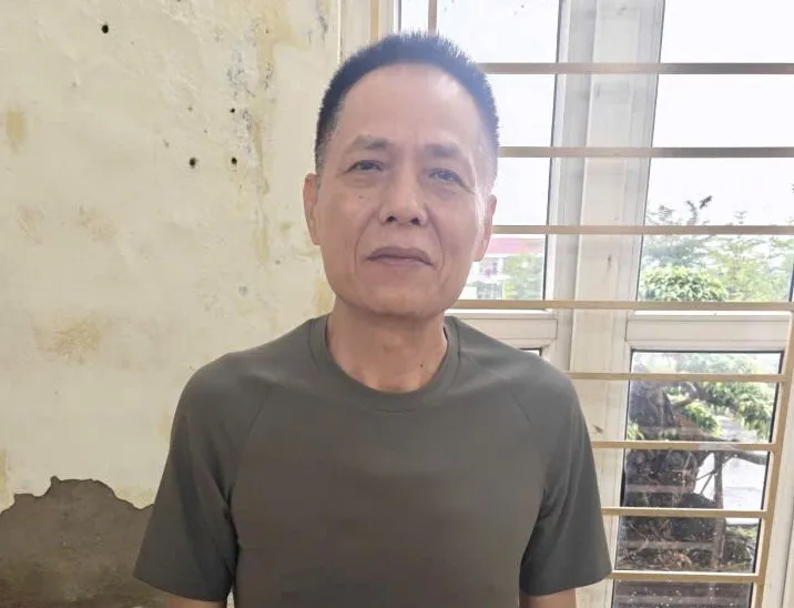 Ông Tạ Viết Đông tại cơ quan công an. Ảnh: Công an cung cấp