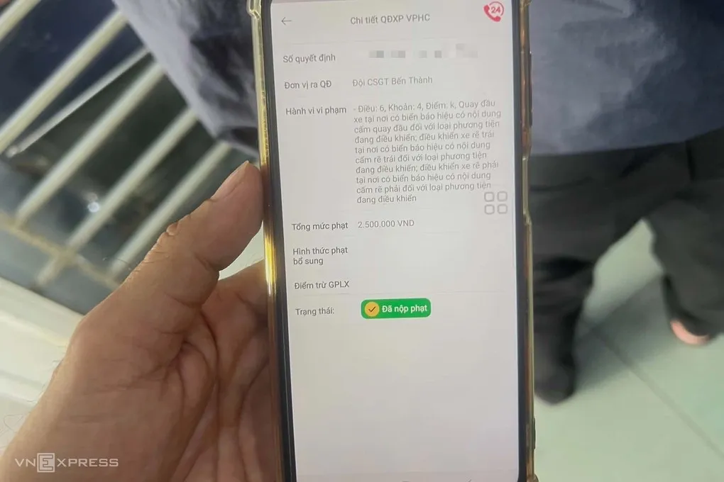 Người vi phạm nhận được thông báo sau khi đã nộp phạt. Ảnh: Phạm Hải
