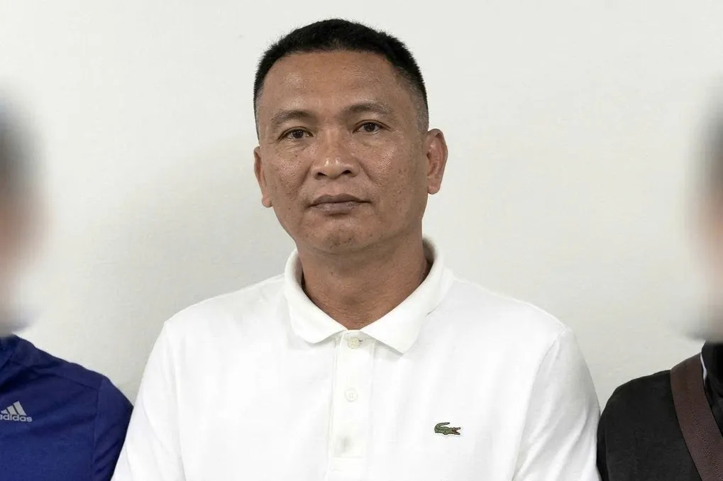 Huỳnh Xuân Vấn tại cơ quan điều tra. Ảnh: Công an TP HCM
